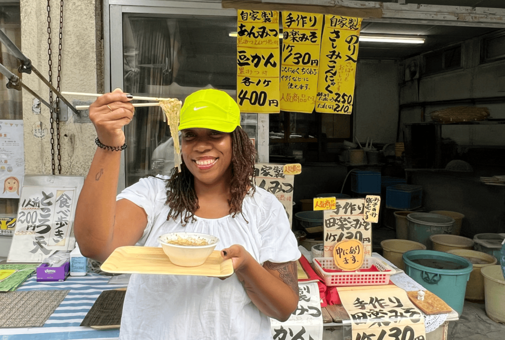 Japan food tour on women only tour girl eating noodles
